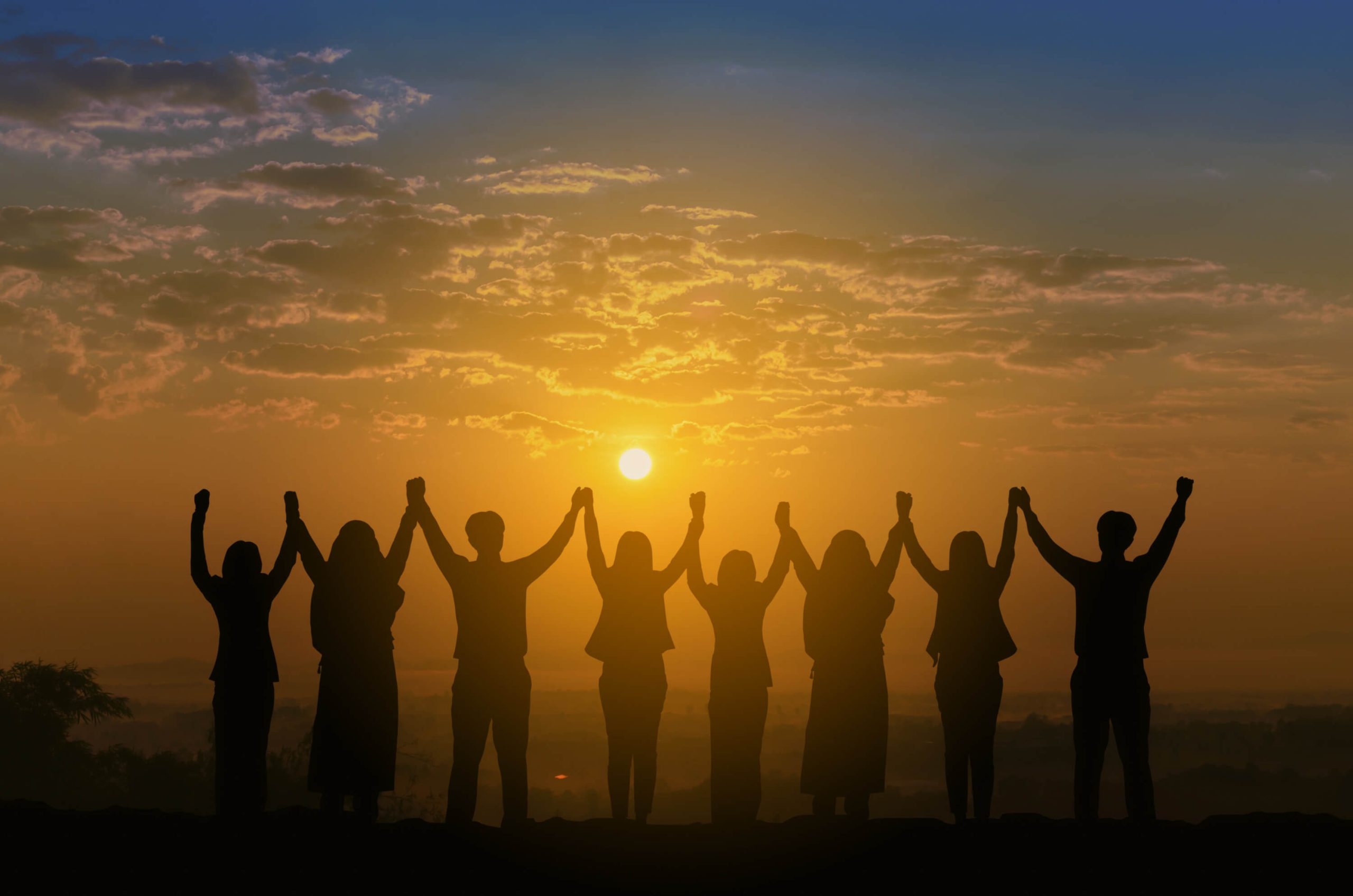 Picture of a human chain at sunset